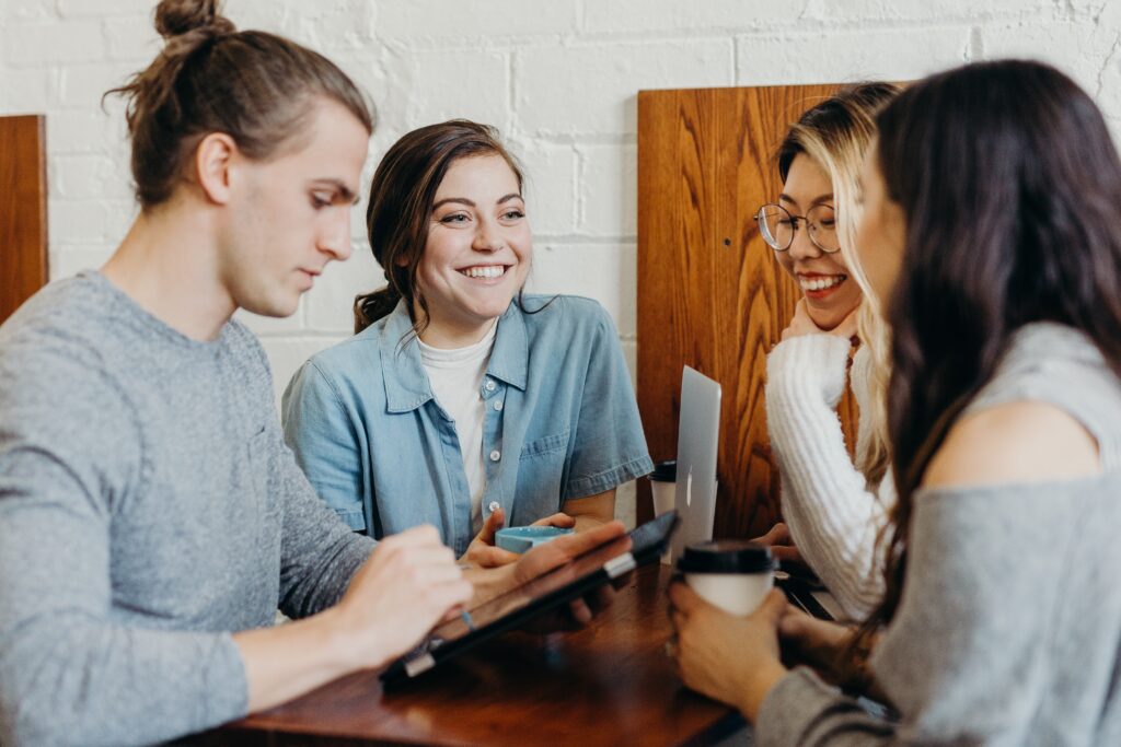 A group of young adults talking: communication skills